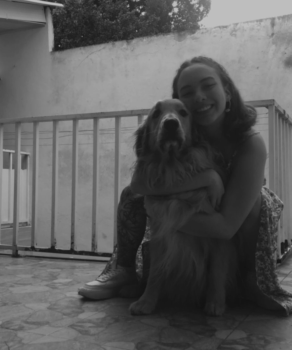 catalina cristancho holding dog