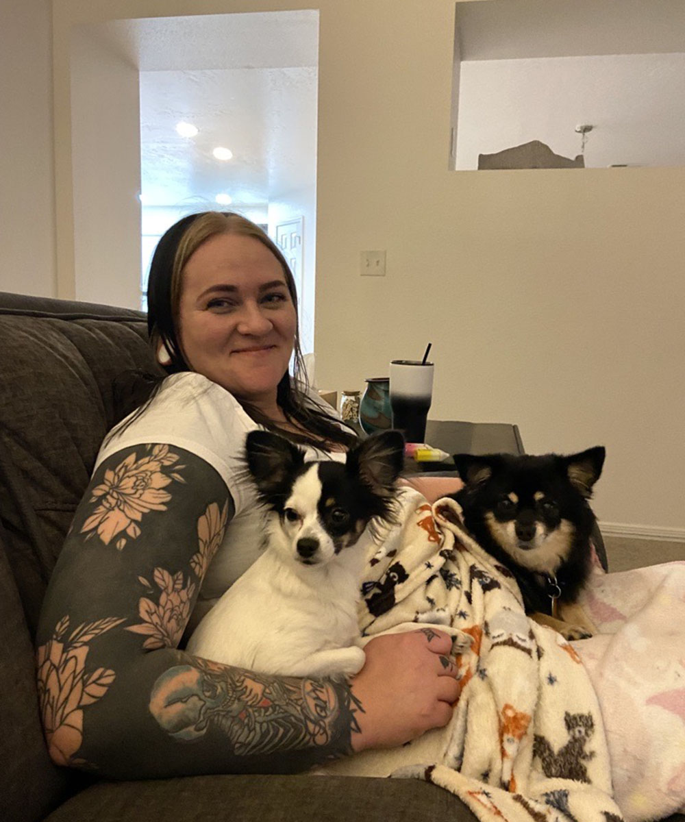 jessica with two dogs on couch