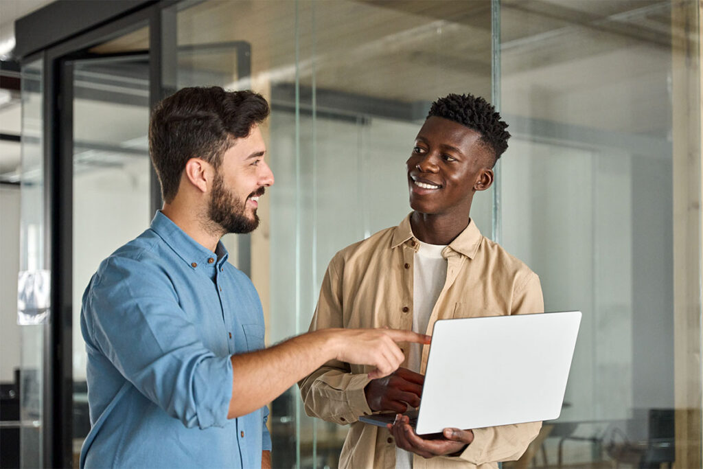 behavioral healthcare software expert explaining to behavioral healthcare manager how AI is transforming revenue cycle management in behavioral health