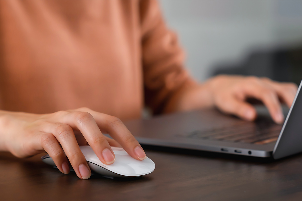 clinic leader at computer comparing behavioral health EHR platforms