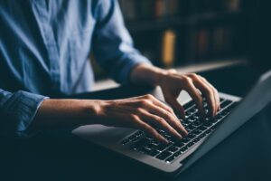 Solo providers at computer evaluating top 5 EMR software solutions for small practices